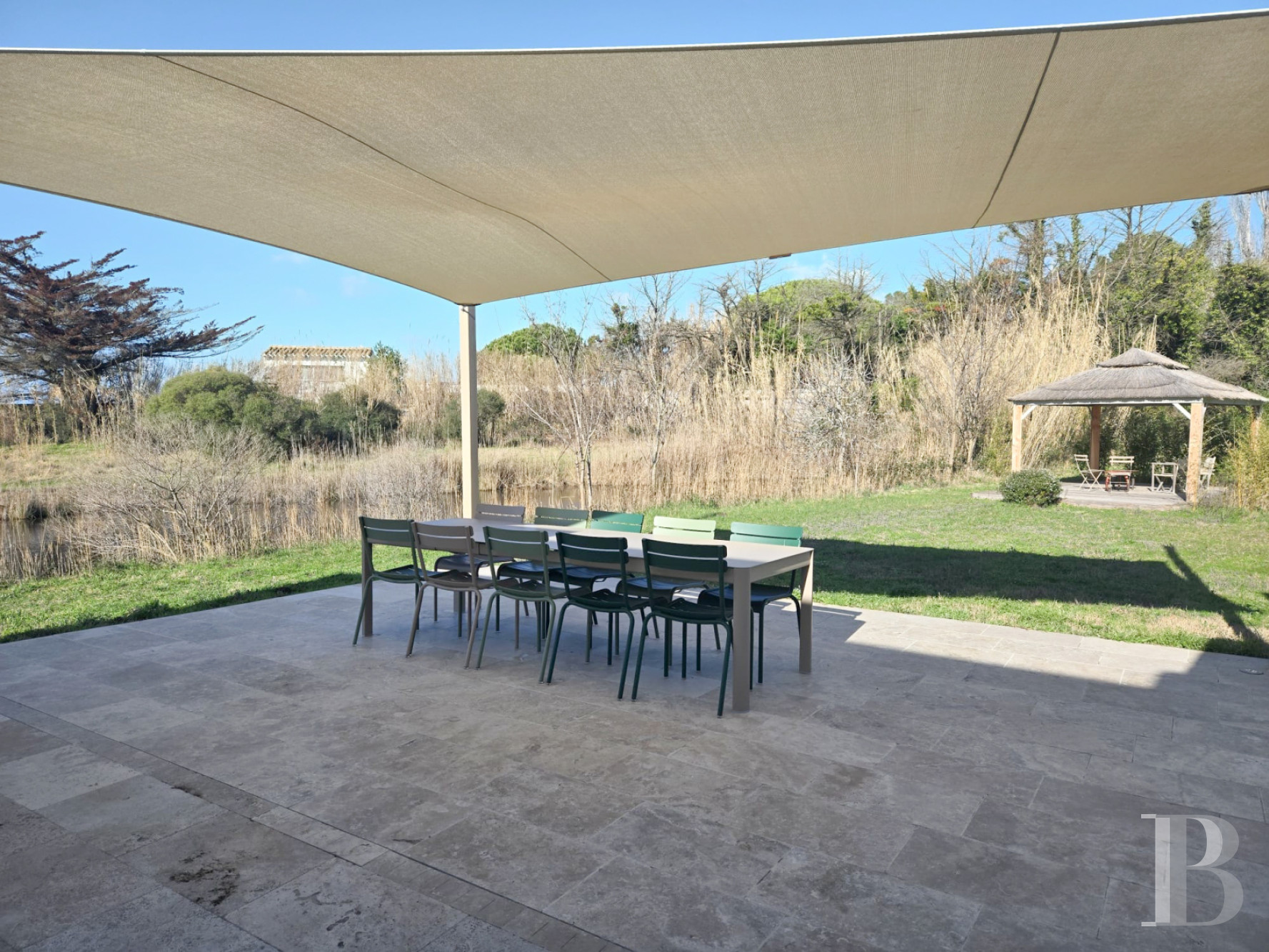 A farmhouse set amidst the marshes north of Saintes-Maries-de-la-Mer, in the Camargue - photo  n°14
